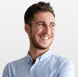 Confident smiling young men looking at right side